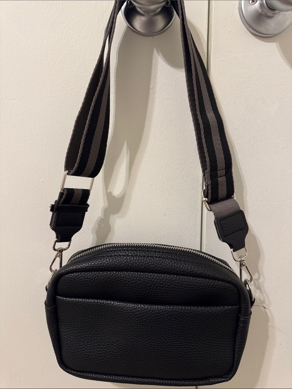 Classic Black Pebbled Crossbody Bag with Striped Strap